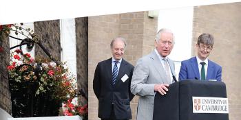 King Charles giving a speech outside at a University of Cambridge lecturn