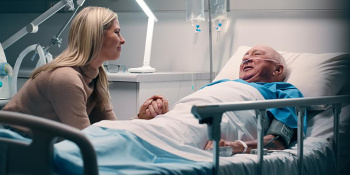 Man in hospital bed