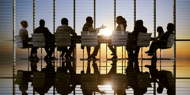 A meeting held in a office