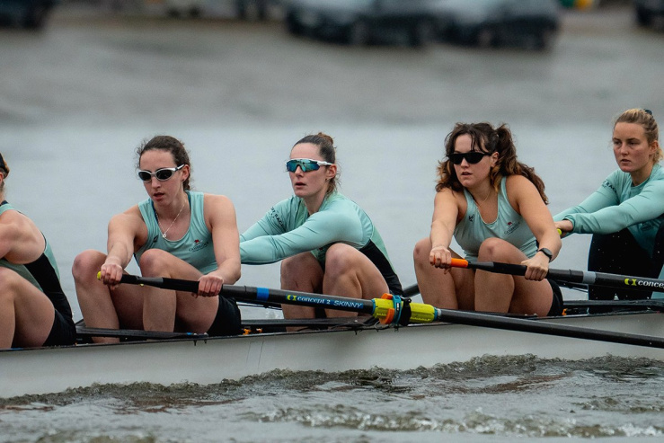 A team rowing in Cambridge blue jerseys