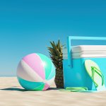 Blue skies, sand and picnic esky