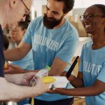 photo of 2 volunteers at a food bank