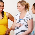 Image showing women pregnant women talking and smiling.
