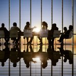 A meeting held in a office