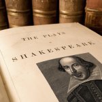 A book titled 'The Plays of Shakespeare'