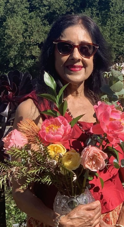 Profile picture of Bharti with flowers