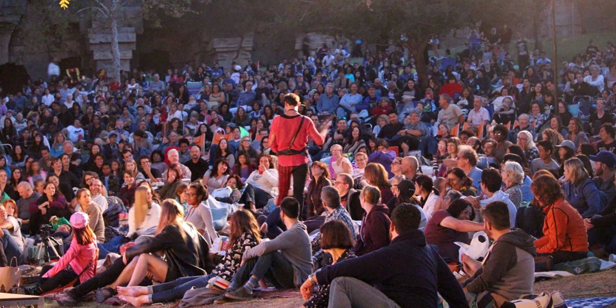 Shakespeare in the Park - an actor in the middle of the crowd