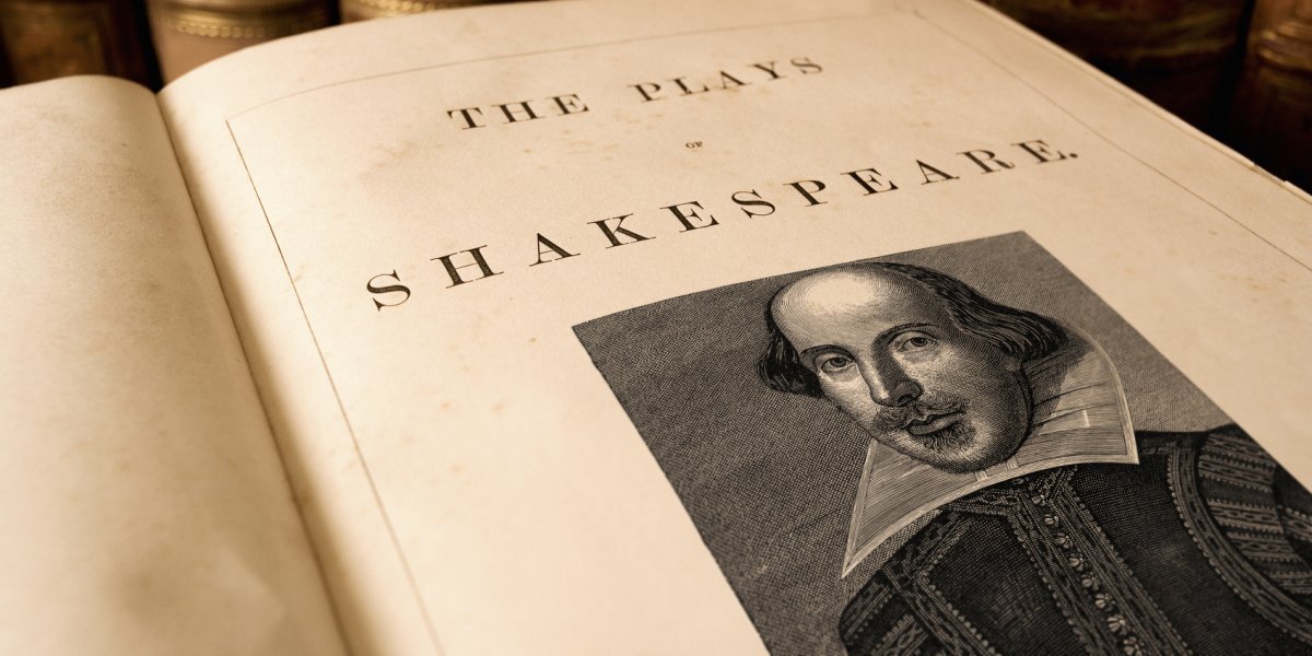 A book titled 'The Plays of Shakespeare'